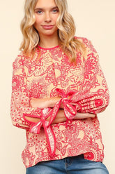 Elegant Floral Blouse with Ribbon Bow Detail and Round Neck | Haptics